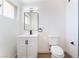 Bathroom boasts a stylish vanity with modern fixtures and hardware, offering a clean and fresh design at 2878 El Cajon St, Las Vegas, NV 89169
