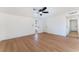 Spacious bedroom featuring wood flooring and a ceiling fan at 2878 El Cajon St, Las Vegas, NV 89169