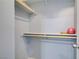 Well-organized closet with wooden shelving for storage and organization at 320 Point Loma Ave, North Las Vegas, NV 89031