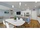 An open-concept kitchen and dining area, with a seamless transition to the adjacent living space at 320 Point Loma Ave, North Las Vegas, NV 89031