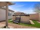 Relaxing backyard with a hot tub and well-manicured landscaping at 605 Cadence Vista Dr, Henderson, NV 89011