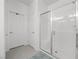 This bathroom boasts a walk in shower with a glass door at 605 Cadence Vista Dr, Henderson, NV 89011