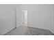 This bedroom boasts wood-look tile flooring and a walk in closet at 605 Cadence Vista Dr, Henderson, NV 89011