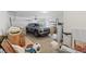 Functional garage space with ample storage and parking for a vehicle at 605 Cadence Vista Dr, Henderson, NV 89011