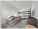Bright living room with gray sofa, TV, and lots of space for relaxing at 605 Cadence Vista Dr, Henderson, NV 89011