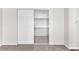 Open closet featuring shelving and neutral carpeting that is perfect for storage at 6770 Laronda Ln, Las Vegas, NV 89156
