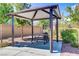 Enjoy a picnic under the gazebo in this community picnic area, complete with BBQ and lush landscaping at 10290 Lodge Pine Ave, Las Vegas, NV 89166