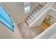 Carpeted staircase with a white railing leading to the upper level of the home at 10290 Lodge Pine Ave, Las Vegas, NV 89166