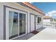 Condo exterior boasting a private entry, sliding glass door, and access to the patio at 1101 Willow Tree Dr # D, Las Vegas, NV 89128