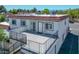 Exterior of the building featuring a spacious private balcony, tile roof and multiple windows at 1101 Willow Tree Dr # D, Las Vegas, NV 89128