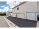 Exterior view of garages in a residential community under a sunny sky at 1101 Willow Tree Dr # D, Las Vegas, NV 89128