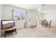 Inviting living room features ample space, natural light, and dining area adjacent at 1101 Willow Tree Dr # D, Las Vegas, NV 89128