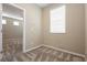 Bedroom area featuring neutral carpet, bright natural light, and neutral walls at 11236 Rainbow Peak Ave # 210, Las Vegas, NV 89135