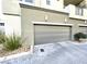 This two-car garage has a modern design and is conveniently located near the home's entrance at 11236 Rainbow Peak Ave # 210, Las Vegas, NV 89135