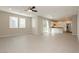 Spacious open floor plan combining living and kitchen areas with modern finishes and neutral colors at 11236 Rainbow Peak Ave # 210, Las Vegas, NV 89135