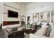 Luxurious lobby boasting stylish seating, modern decor, and a contemporary fireplace feature at 11236 Rainbow Peak Ave # 210, Las Vegas, NV 89135