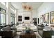 Grand lobby featuring soaring ceilings, modern lighting, comfortable seating, and striking artwork at 11236 Rainbow Peak Ave # 210, Las Vegas, NV 89135