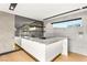 Wet bar with marble countertops, tiled backsplash, and a modern aesthetic at 12 Falling Canyon Ct, Henderson, NV 89011