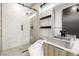Modern bathroom with walk-in shower, sleek vessel sink, and contemporary fixtures at 12 Falling Canyon Ct, Henderson, NV 89011