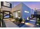 Contemporary home featuring an inviting front entrance with a modern walkway and a minimalist design at 12 Falling Canyon Ct, Henderson, NV 89011