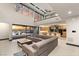 Open-concept living room with gourmet kitchen and stunning views of the outdoors at 12 Falling Canyon Ct, Henderson, NV 89011