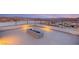 Modern roof deck featuring a cozy fire pit and panoramic views of the surrounding landscape at 12 Falling Canyon Ct, Henderson, NV 89011