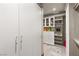 Organized walk-in closet featuring built-in storage, shelving, and ample hanging space at 12 Falling Canyon Ct, Henderson, NV 89011