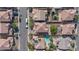 Overhead view of neighborhood highlighting landscaped yards, swimming pools, and well-maintained tile roofs at 1212 Equator Ave, North Las Vegas, NV 89032