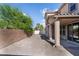 The home has a nice covered patio and block wall at 1212 Equator Ave, North Las Vegas, NV 89032