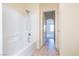 A bathroom with a tub and shower combination at 1212 Equator Ave, North Las Vegas, NV 89032