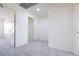 An empty bedroom with neutral carpet and fresh paint at 1212 Equator Ave, North Las Vegas, NV 89032