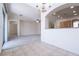 Tile floor dining room featuring an open kitchen and archway at 1212 Equator Ave, North Las Vegas, NV 89032