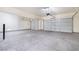 Spacious two car garage with automatic doors provides secure parking and extra storage at 1212 Equator Ave, North Las Vegas, NV 89032