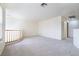 Spacious loft with a railing, offering a versatile space for recreation or relaxation and lots of natural light at 1212 Equator Ave, North Las Vegas, NV 89032