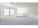 Bright loft with windows, perfect for a play area, home office, or reading nook bathed in natural light at 1212 Equator Ave, North Las Vegas, NV 89032