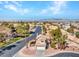 Beautiful aerial view of a home in a lush neighborhood setting, complete with desert landscaping at 125 Firecreek Cir, Las Vegas, NV 89107