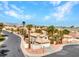 Aerial view of a charming suburban home with a well-manicured yard, showcasing its desirable neighborhood setting at 125 Firecreek Cir, Las Vegas, NV 89107