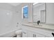 Bathroom featuring a shower-tub combo, window and modern vanity at 125 Firecreek Cir, Las Vegas, NV 89107