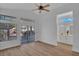 Bright bedroom with lots of natural light from the large window and an attached full bathroom at 125 Firecreek Cir, Las Vegas, NV 89107