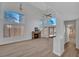 Spacious living room with tall ceilings and lots of natural light from the large windows at 125 Firecreek Cir, Las Vegas, NV 89107