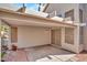 Enclosed outdoor patio with a covered roof, offering a private space to relax or entertain at 125 Firecreek Cir, Las Vegas, NV 89107