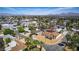 Aerial view of home on a corner lot, desert landscaping, and mature palm trees at 1400 Cottonwood Pl, Las Vegas, NV 89104