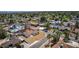 Aerial view of home with desert landscaping and mature palm trees in residential area at 1400 Cottonwood Pl, Las Vegas, NV 89104