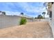 Backyard featuring desert landscaping and a block wall, providing privacy at 1400 Cottonwood Pl, Las Vegas, NV 89104