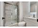 Modern bathroom with a glass-enclosed shower, stylish tile, and contemporary fixtures at 1400 Cottonwood Pl, Las Vegas, NV 89104