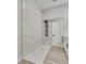 Modern bathroom featuring a walk-in shower with double shower head and marble accents at 1400 Cottonwood Pl, Las Vegas, NV 89104
