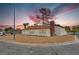 Charming single-story home with a well-maintained exterior, and desert style landscape at 1400 Cottonwood Pl, Las Vegas, NV 89104