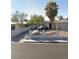 Charming single-story home with mature landscaping, and a concrete fence at 1804 David Ave, Las Vegas, NV 89101