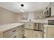 Modern kitchen featuring stainless steel appliances, countertops, and ample cabinet storage at 1804 David Ave, Las Vegas, NV 89101