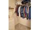 Walk-in closet with hanging rods, upper storage, and lower shelving offers ample space for organization at 2260 Rugged Mesa Dr, Laughlin, NV 89029